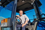 Andrew Bowie MP in a tractor