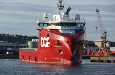 A ship exiting the Port of Aberdeen